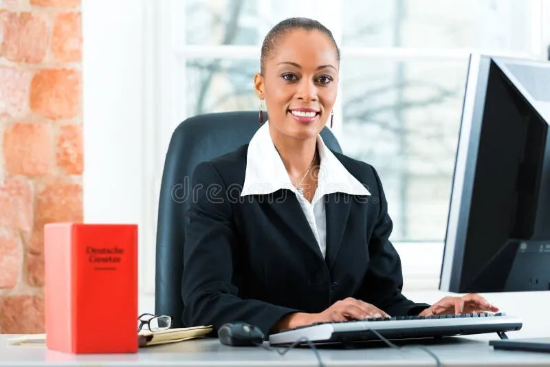 lawyer-her-office-law-book-computer-young-female-working-typical-writing-31285642